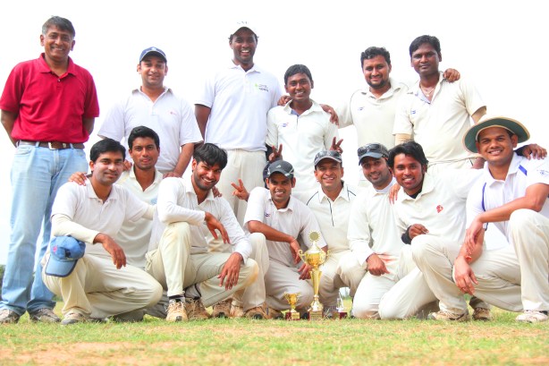 GE with the Champions trophy. © The CouchExpert